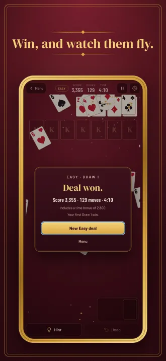 Screenshot, “Win, and watch them fly.”: cards flying across the table behind the Deal won card.